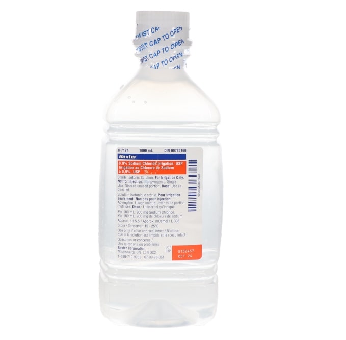 Baxter 0.9 percent sodium chloride irrigation 1000ml sterile saline bottle for dental and surgical use