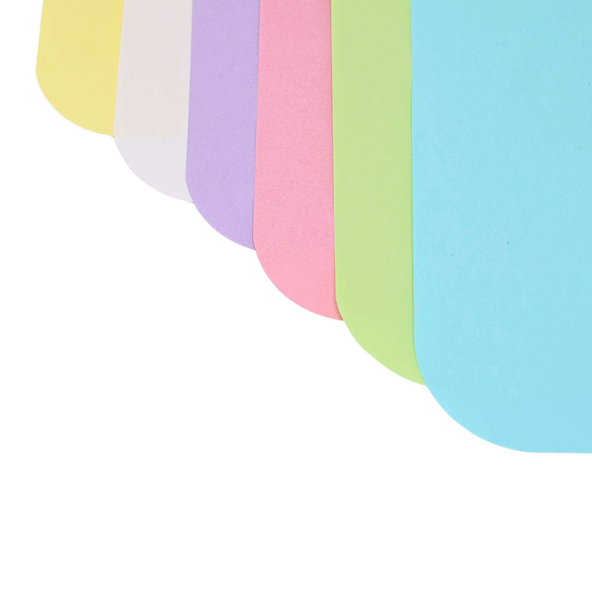 Close-up of colorful paper tray covers for dental trays 8.5 x 12.25 inches