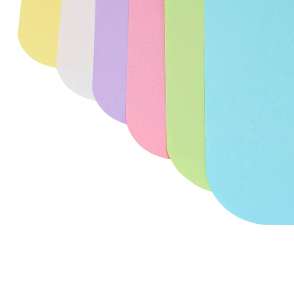 Close-up of colorful paper tray covers for dental trays 8.5 x 12.25 inches