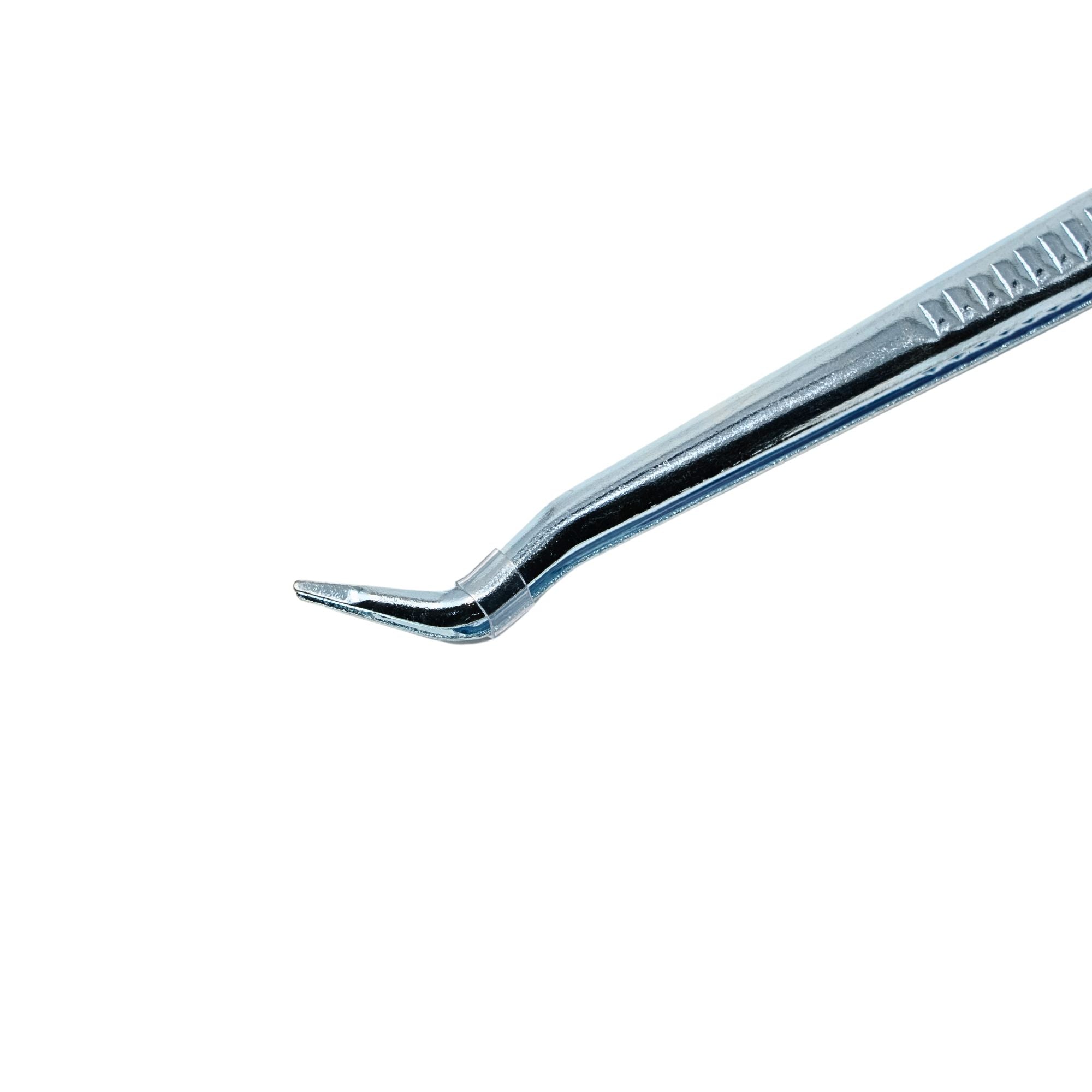 Close-up of stainless steel dental tweezer tip