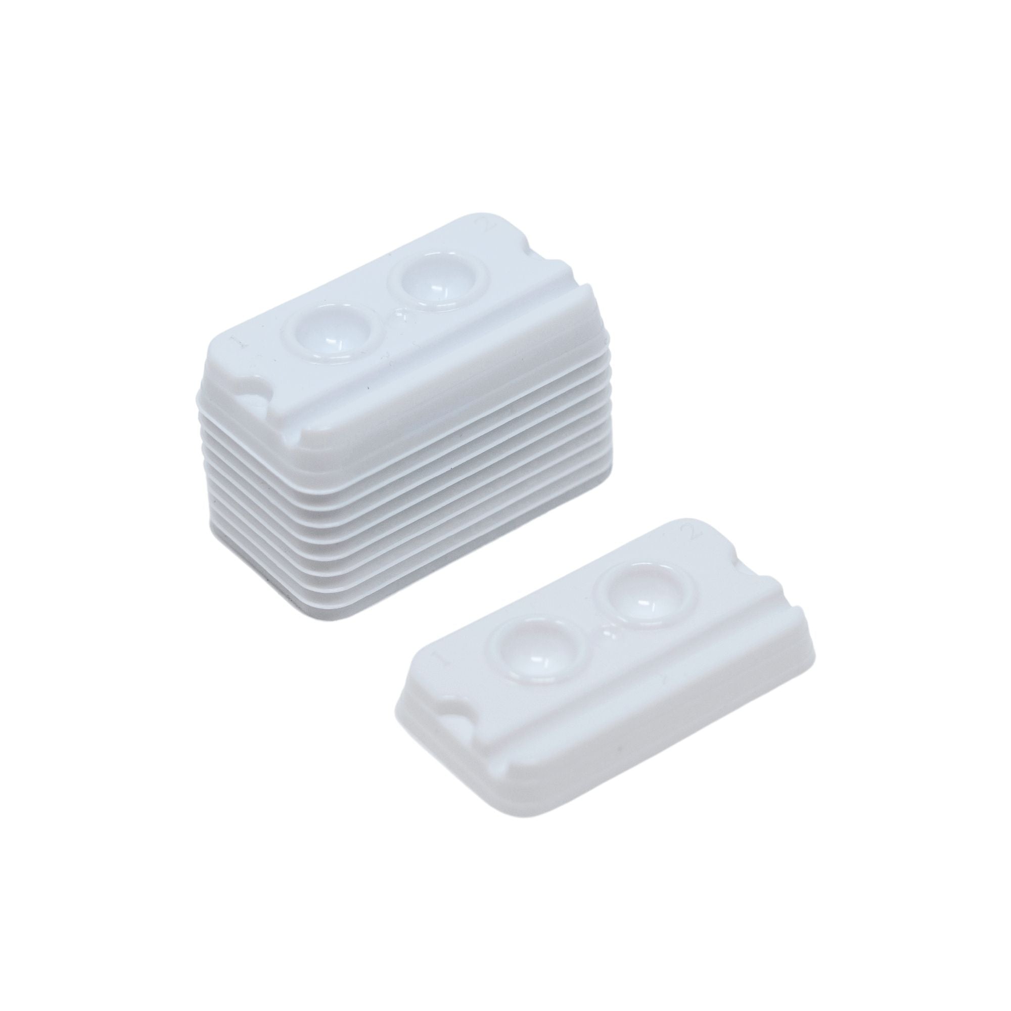 dental mixing wells with two holes each for material preparation