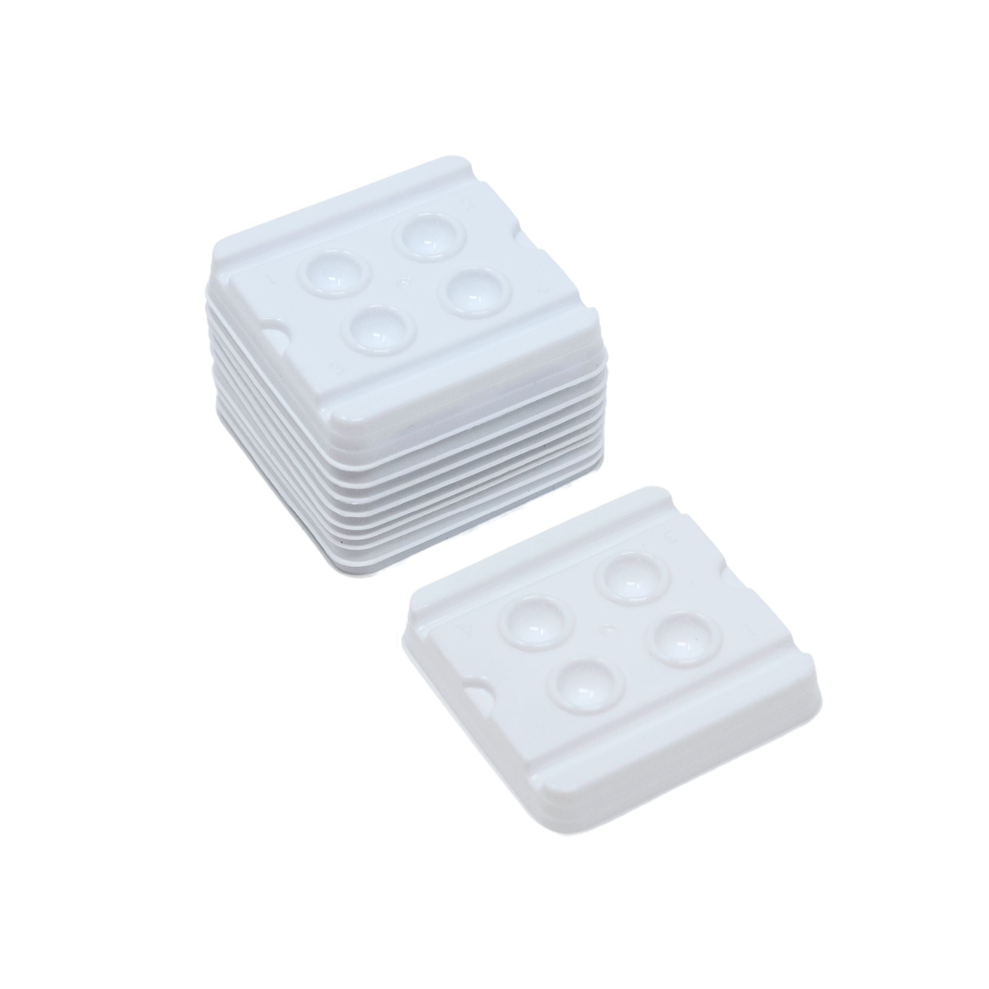 dental mixing wells with four holes each for material preparation