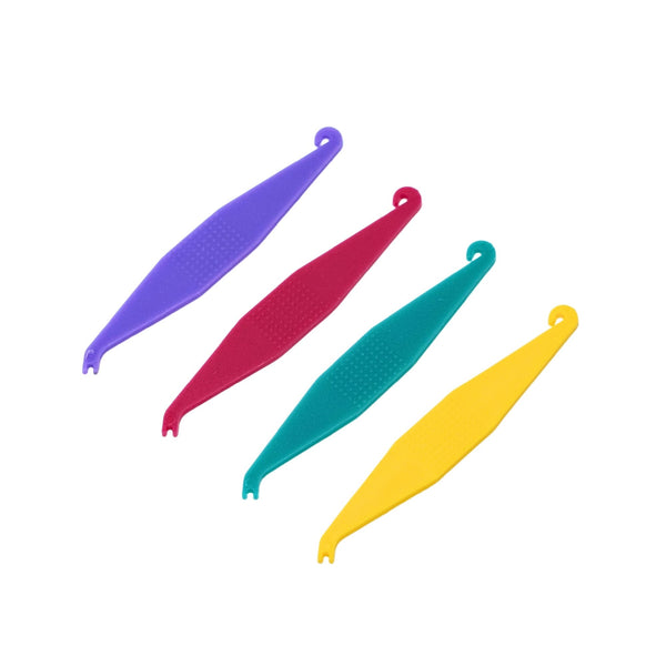 Orthodontic elastic placers with textured grip multi-colored
